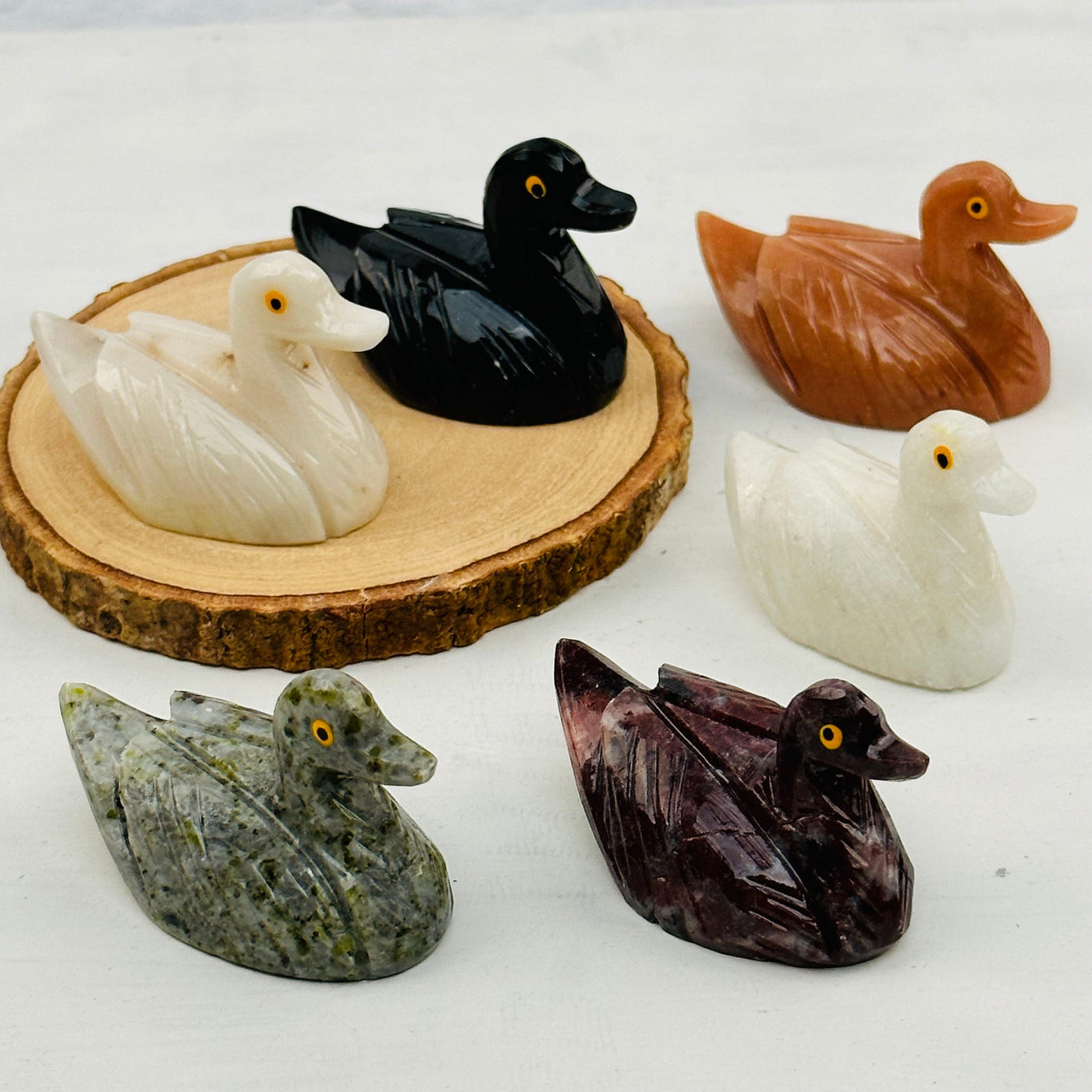multiple ducks displayed to show the differences in the crystal types 