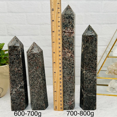 Yooperlite Polished Point - By Weight - next to a ruler for size reference