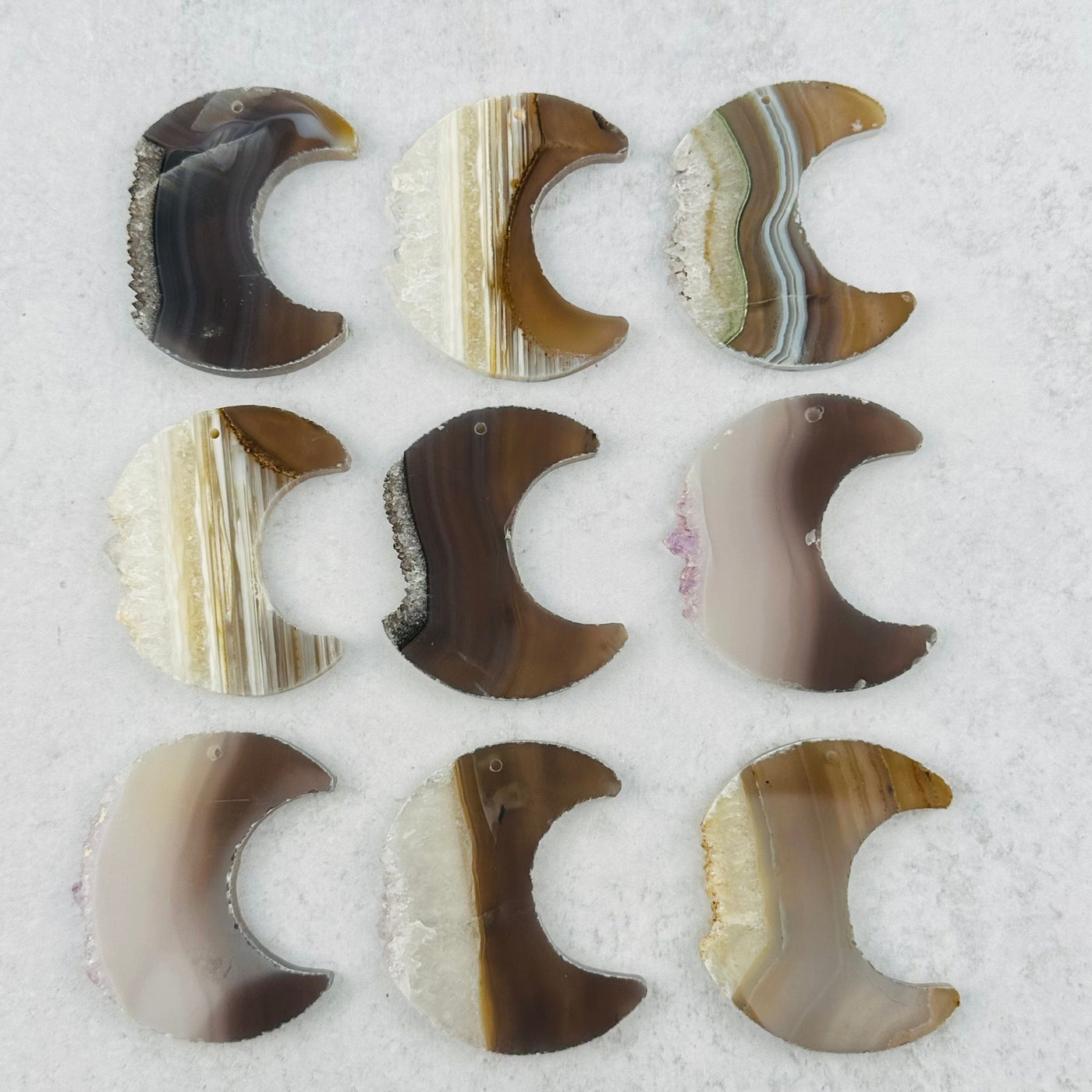 multiple moon slices displayed to show the differences in the color shades 