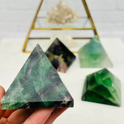 Fluorite Pyramid AA Quality in hand for size reference 