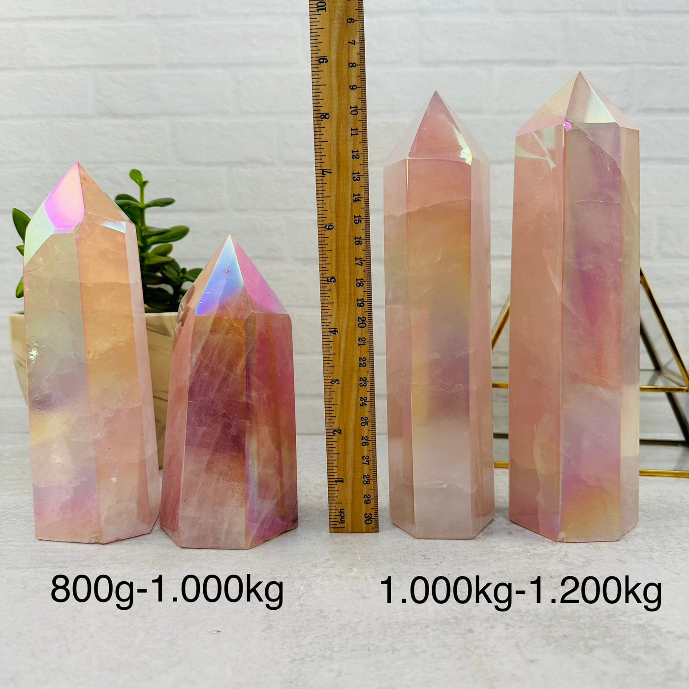 Angel Aura Rose Quartz Polished Tower - By Weight - next to a ruler for size reference 