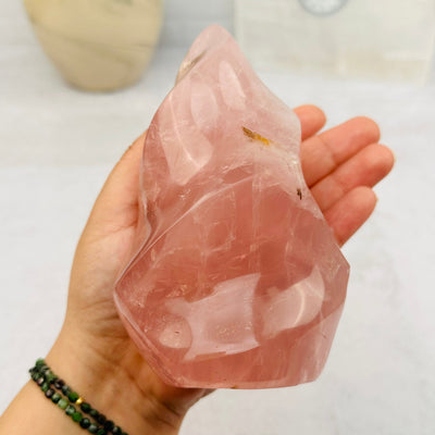 Rose Quartz Flame Tower in hand for size reference 