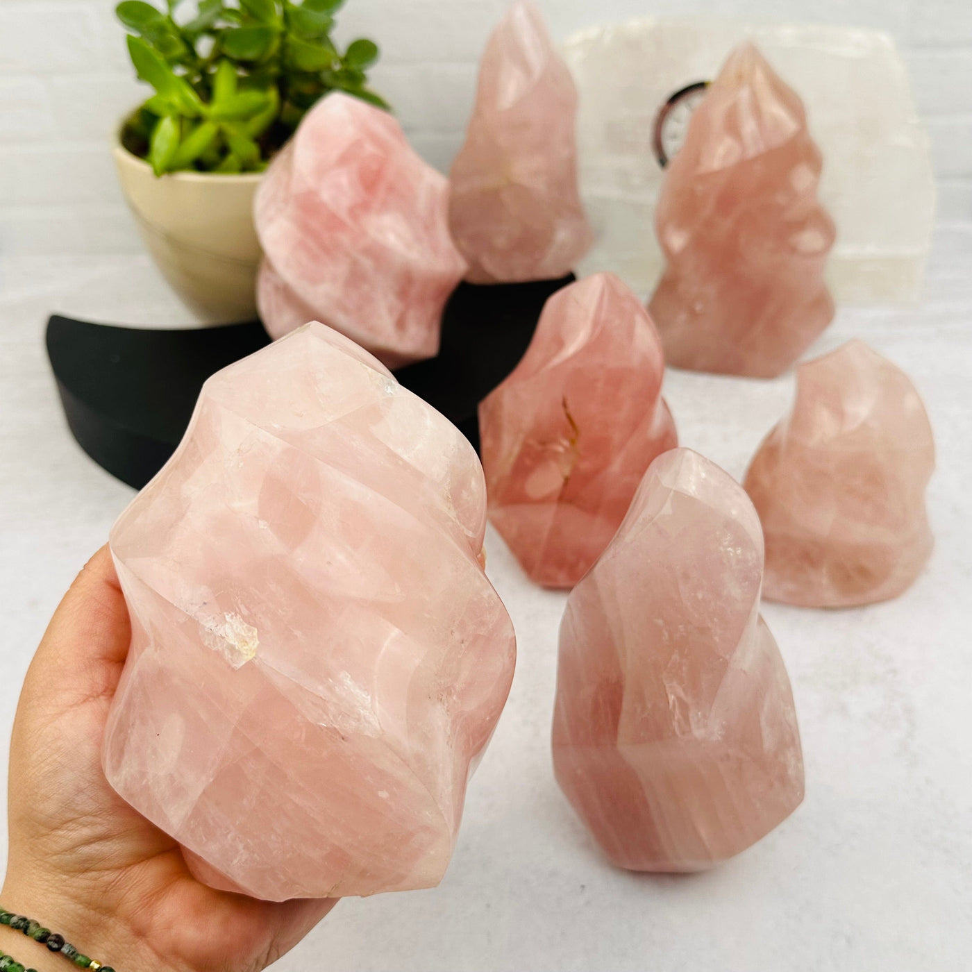 Rose Quartz Flame Tower - By Weight - in hand for size reference 