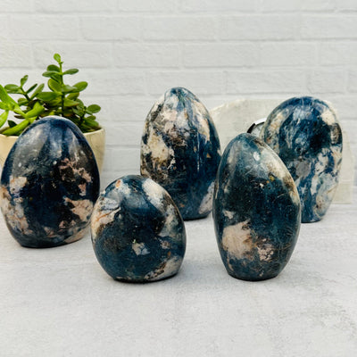 multiple Dumortierite Cut base - By Weight - displayed to show the differences in the sizes 