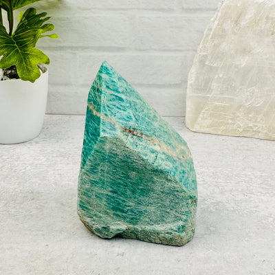 Amazonite Semi Polished Point displayed as home decor