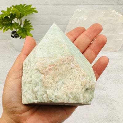 Amazonite Semi Polished Point - By Weight in hand for size reference 