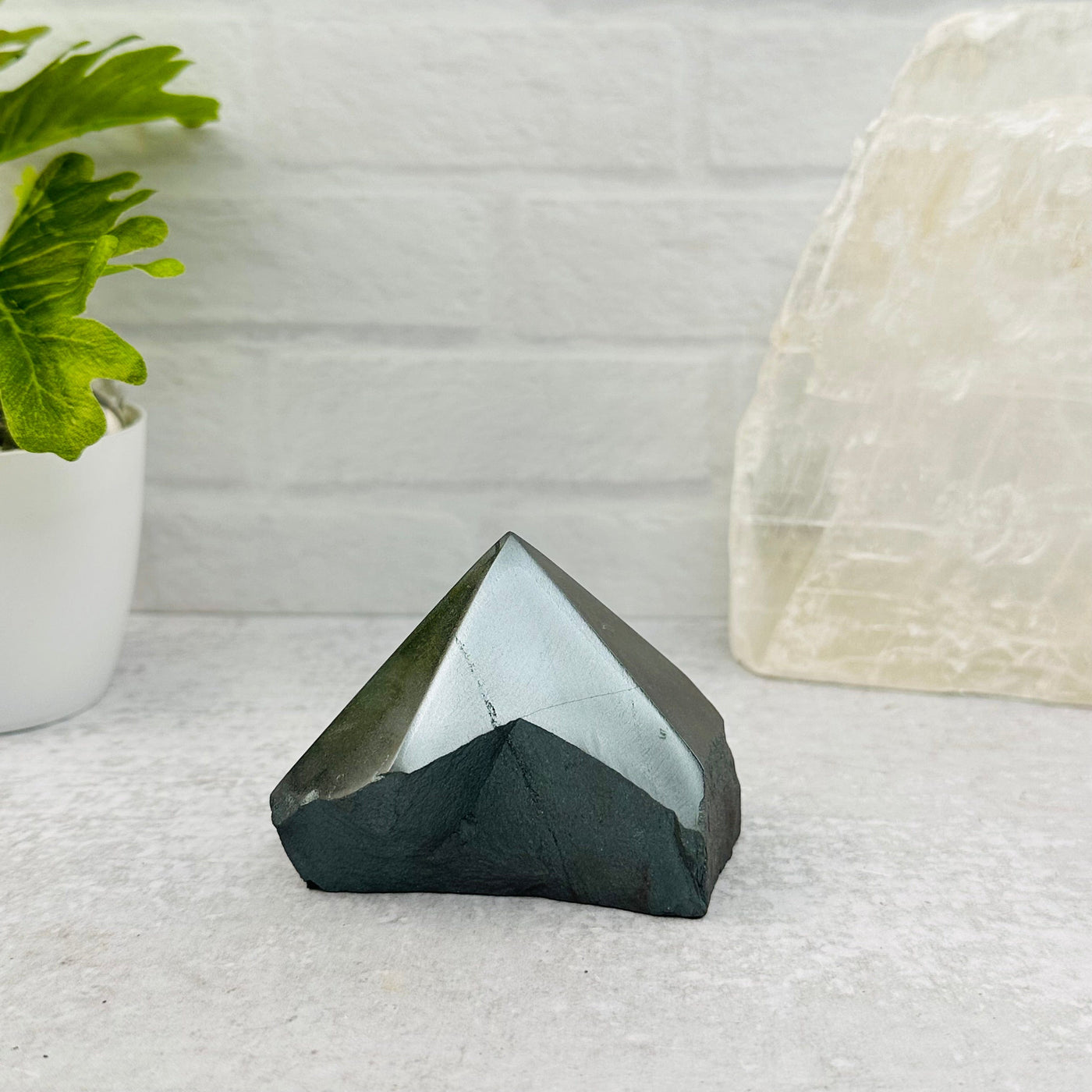 Hematite Semi-Polished Point displayed as home decor 