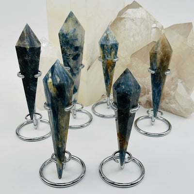 multiple kyanite wands displayed to show the differences in the color shades 