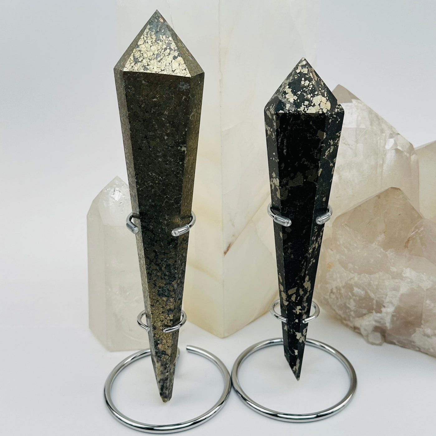 pyrite crystal wands on metal stand displayed as home decor