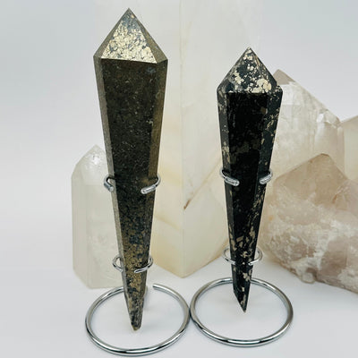 pyrite crystal wands on metal stand displayed as home decor