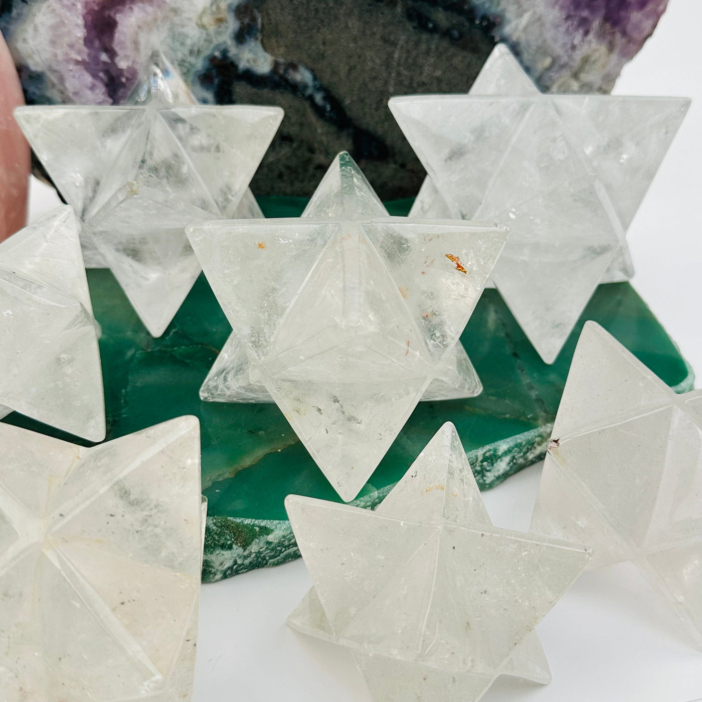 close up of the details on these crystal quartz Merkabah stars