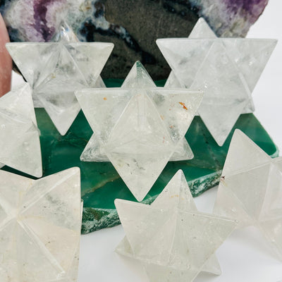 close up of the details on these crystal quartz Merkabah stars