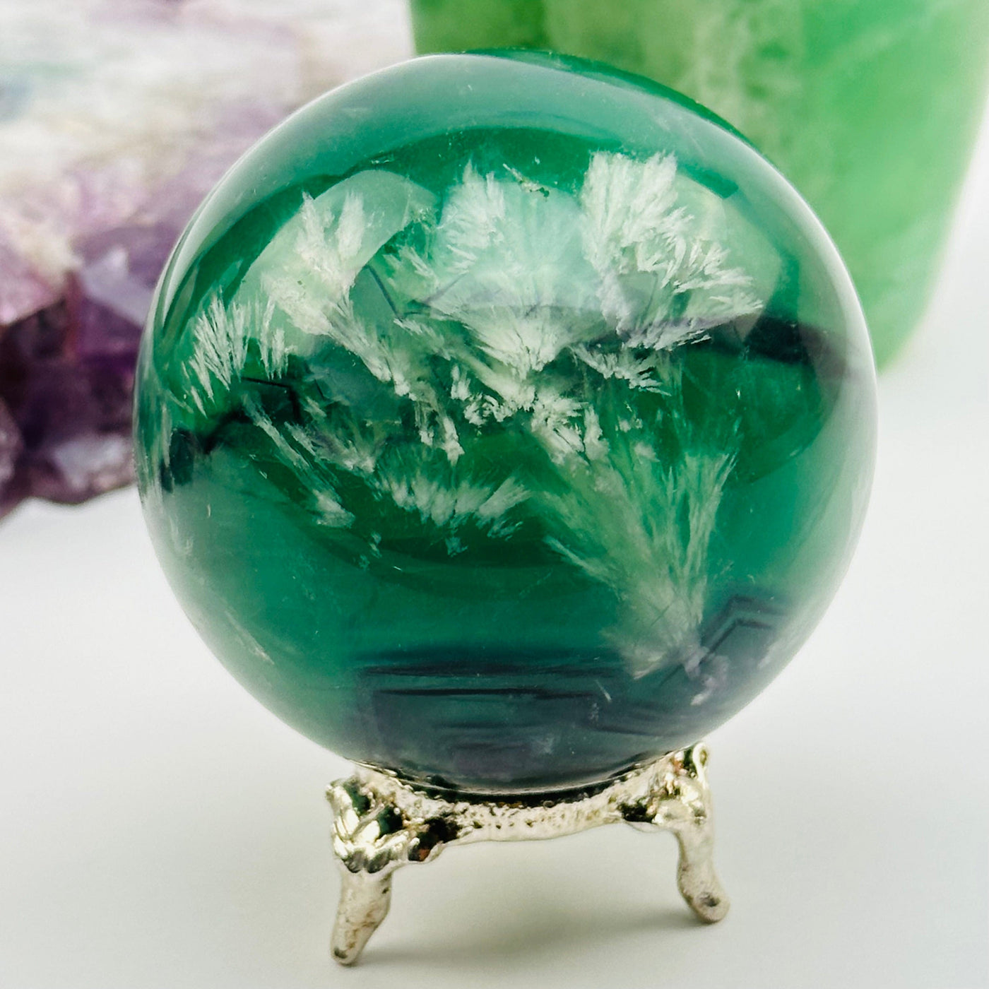 close up of the details on this crystal sphere 