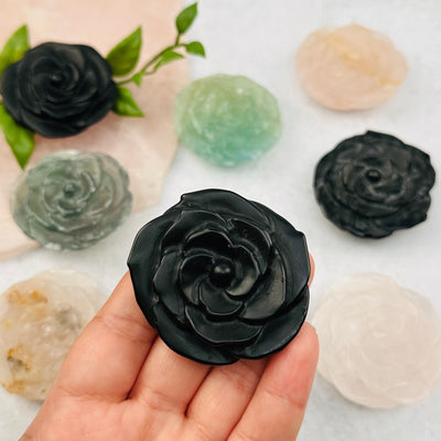 Gemstone Hand Carved Open Rose in hand for size reference 