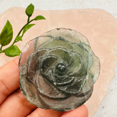 close up of the details on this fluorite carved rose 
