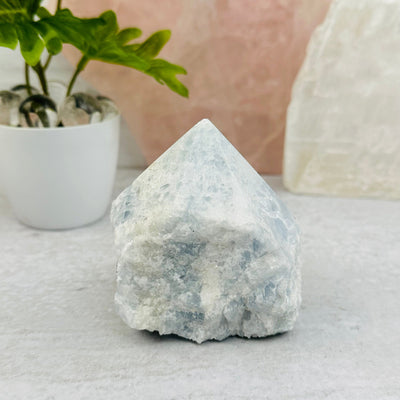 Blue Calcite Semi-Polished Point displayed as home decor 