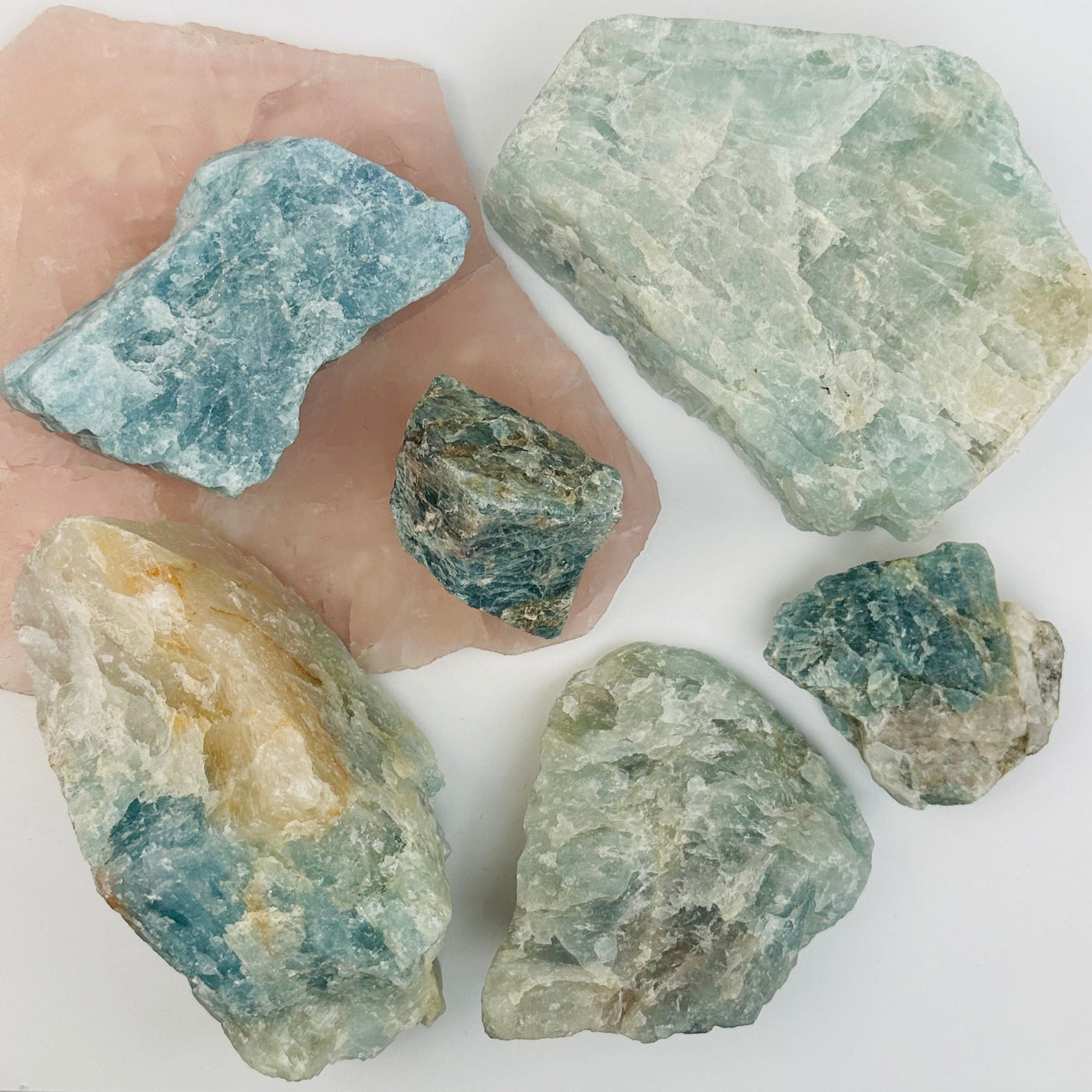 multiple stones displayed to show the differences in the cluster sizes and color shades 