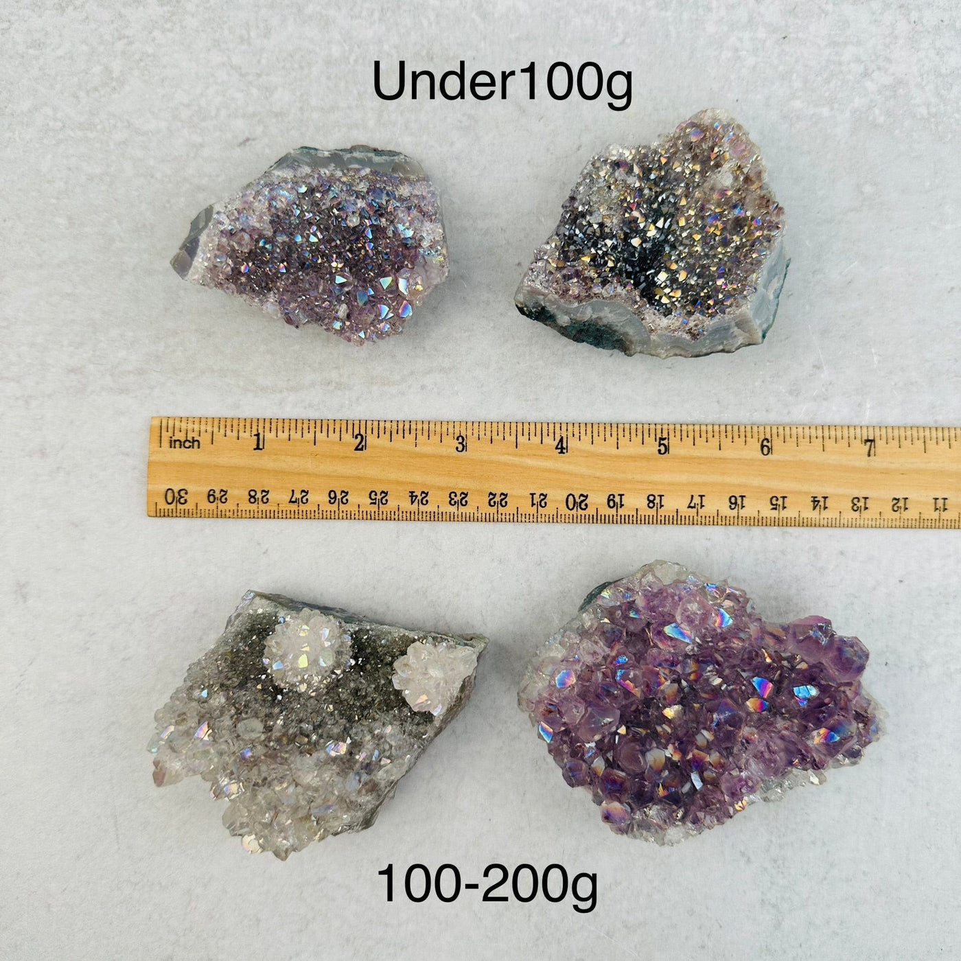 Amethyst Druzy Crystal Cluster with Angel Aura Pearly Finish by weight next to a ruler for size reference 