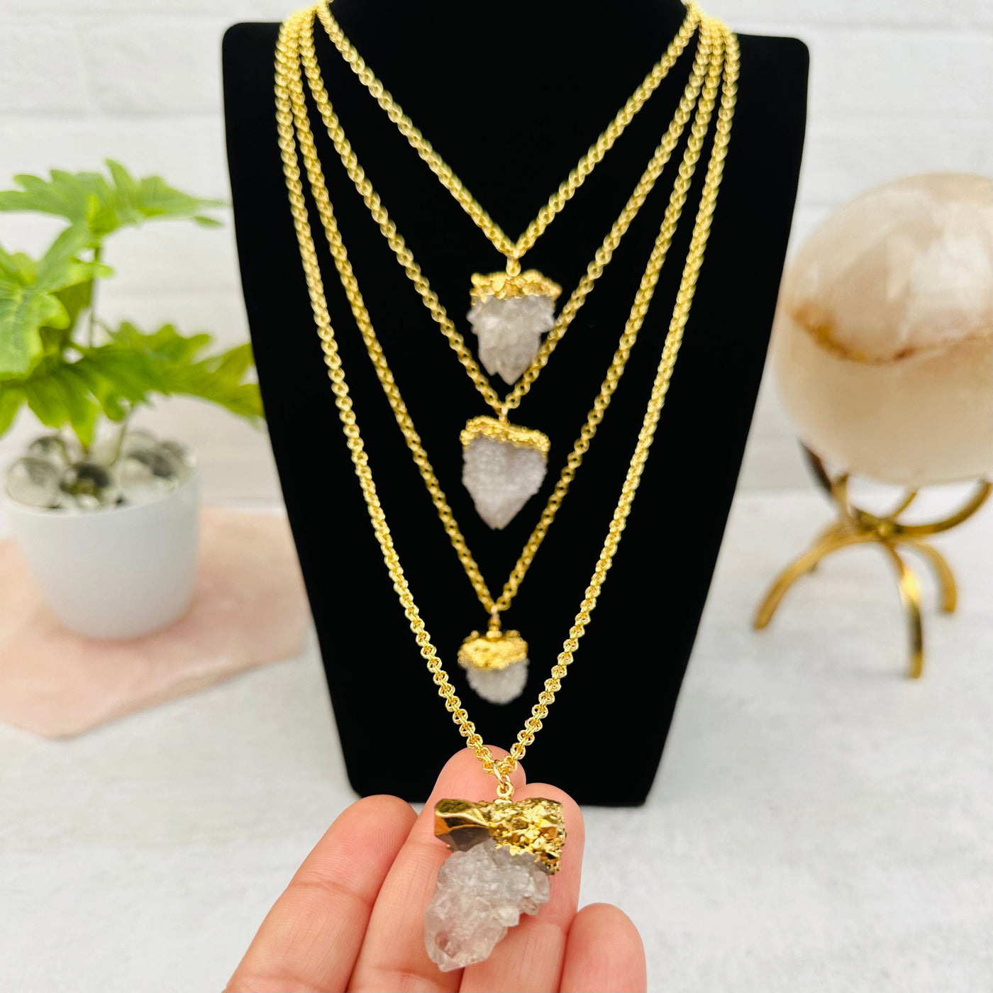 Natural Cactus Quartz Necklaces displayed to show the differences int he cluster sizes 