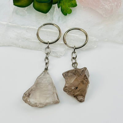 close up of the details on these crystal key chains 