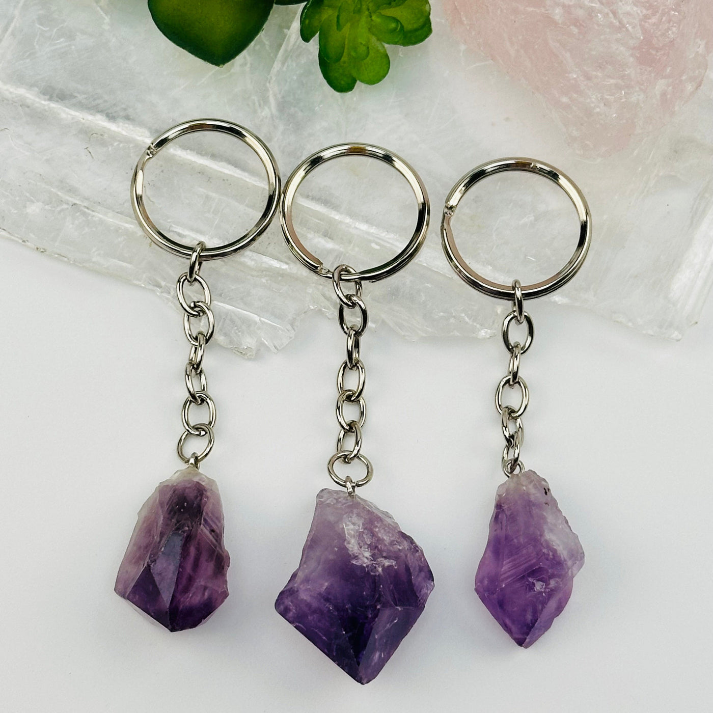 close up of the details on these crystal key chains 