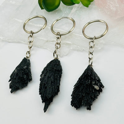 close up of the details on these crystal key chains 