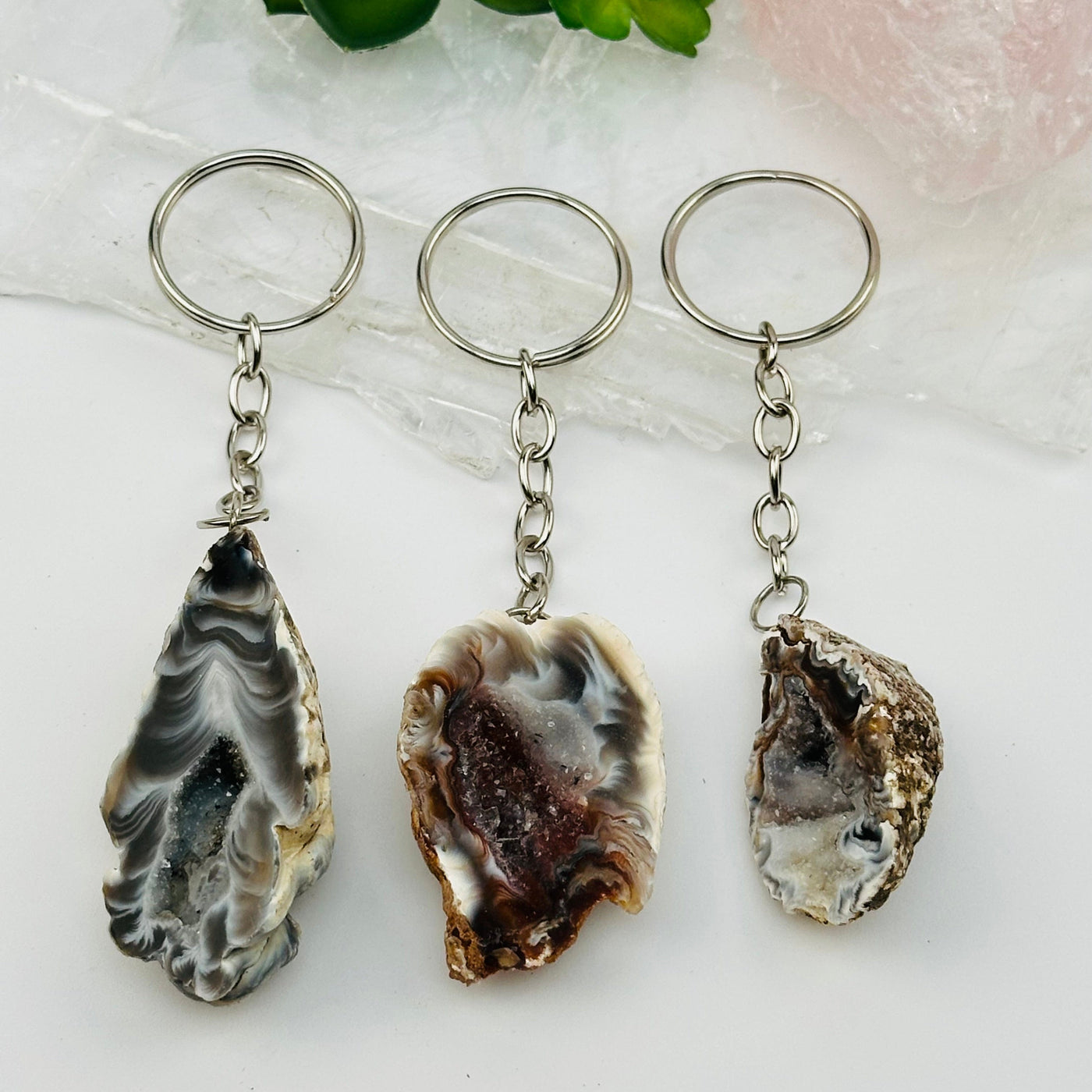 close up of the details on these crystal key chains 