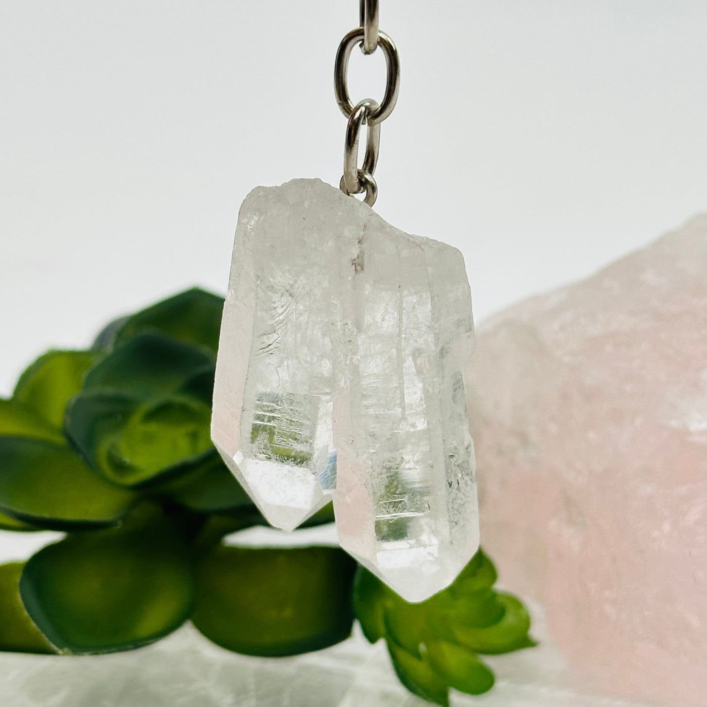 close up of the details on these crystal key chains 