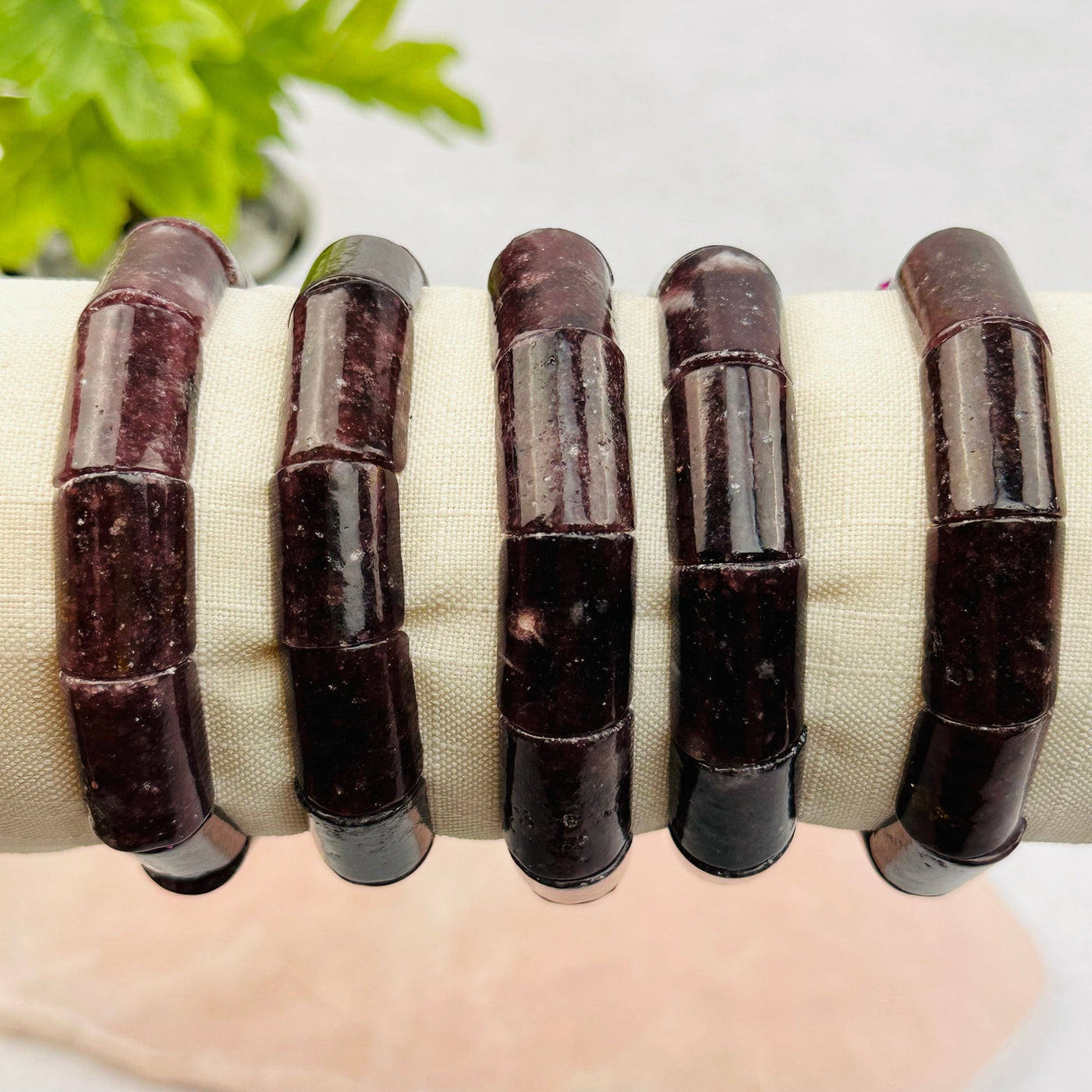 close up of the details on these lepidolite bracelets 