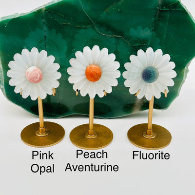 selenite crystal flower displayed next to their gemstone crystal name