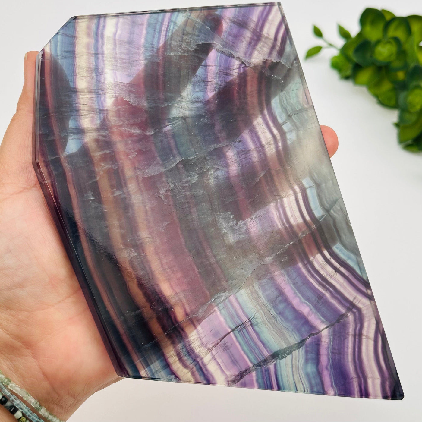close up of the details on these fluorite crystal slabs to show the different color shades