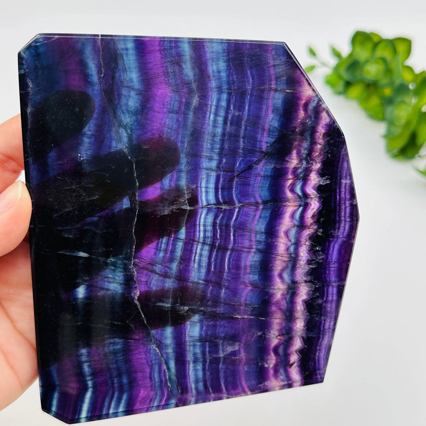 close up of the details on these fluorite crystal slabs to show the different color shades