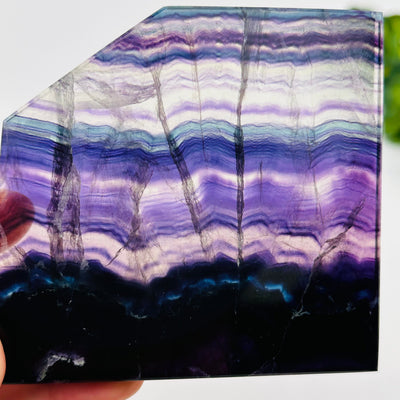 close up of the details on these fluorite crystal slabs to show the different color shades