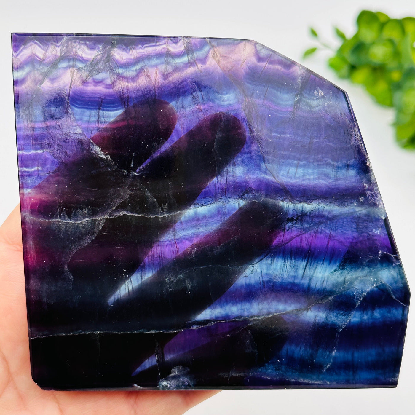 close up of the details on these fluorite crystal slabs to show the different color shades