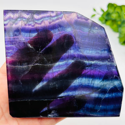 close up of the details on these fluorite crystal slabs to show the different color shades