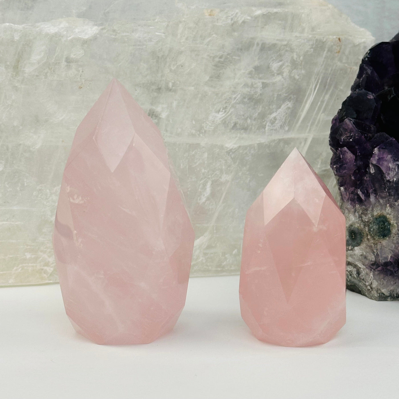 Faceted Rose Quartz Crystal Egg Point displayed as home decor