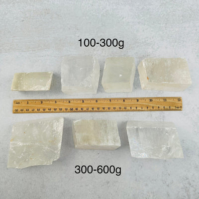 Optical Calcite - White - You Choose Size - next to a ruler for size reference 