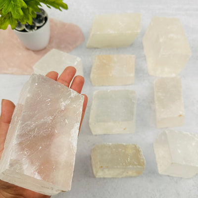 calcite cube in hand for size reference 