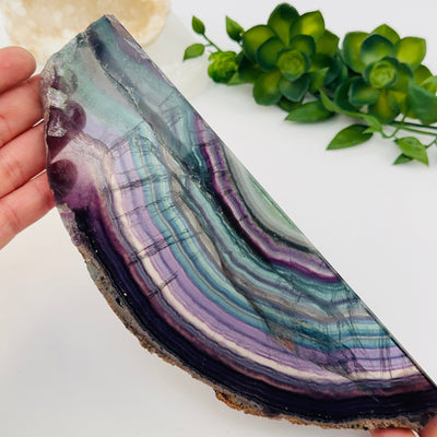 close up of the details on this fluorite semi polished crystal slab 