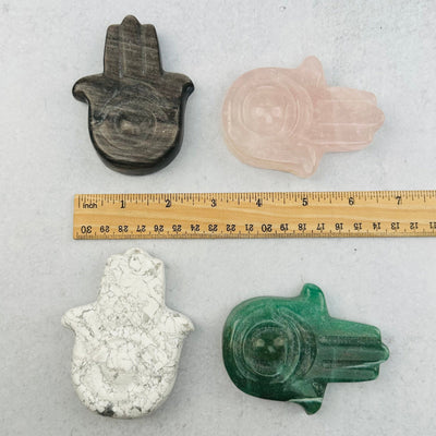 Carved Hamsa Hand Stone with Protective Eye - You Choose Stone - next to a ruler for size reference 