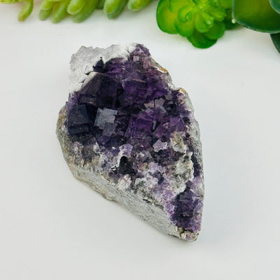 close up of the details on this fluorite cube crystal cluster 