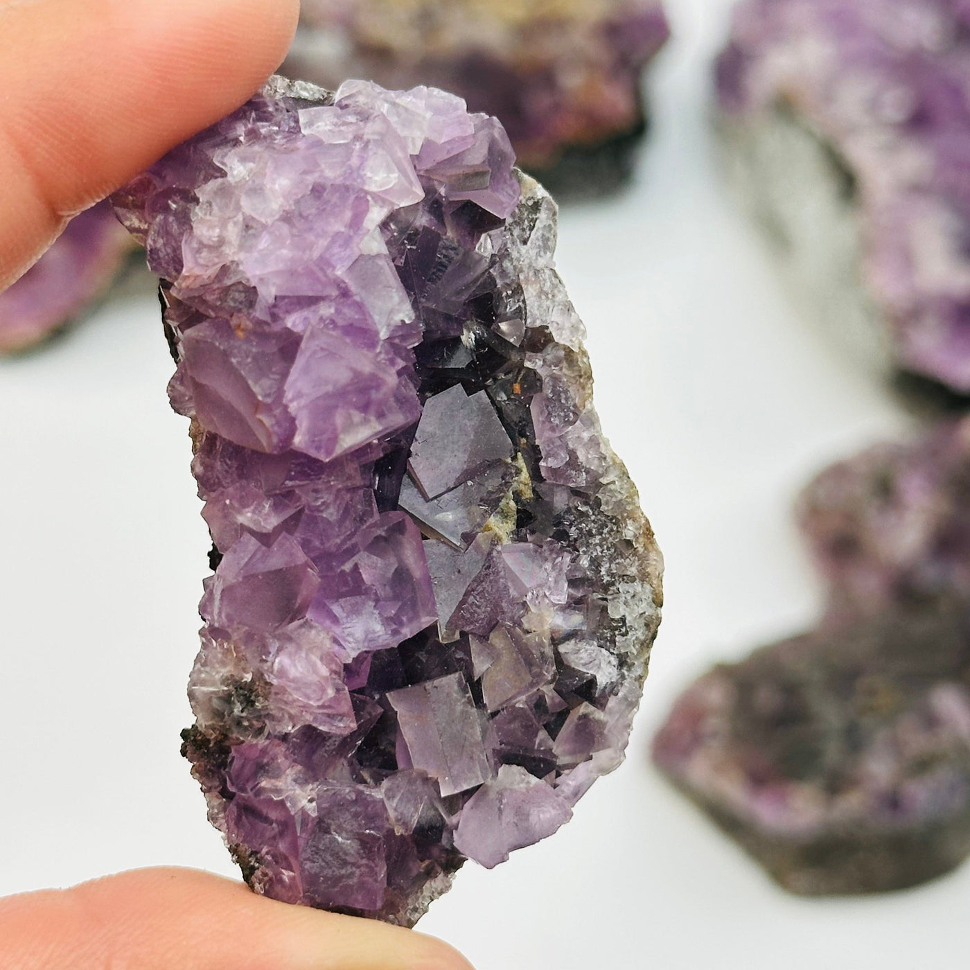 close up of the details on this fluorite cube crystal cluster 