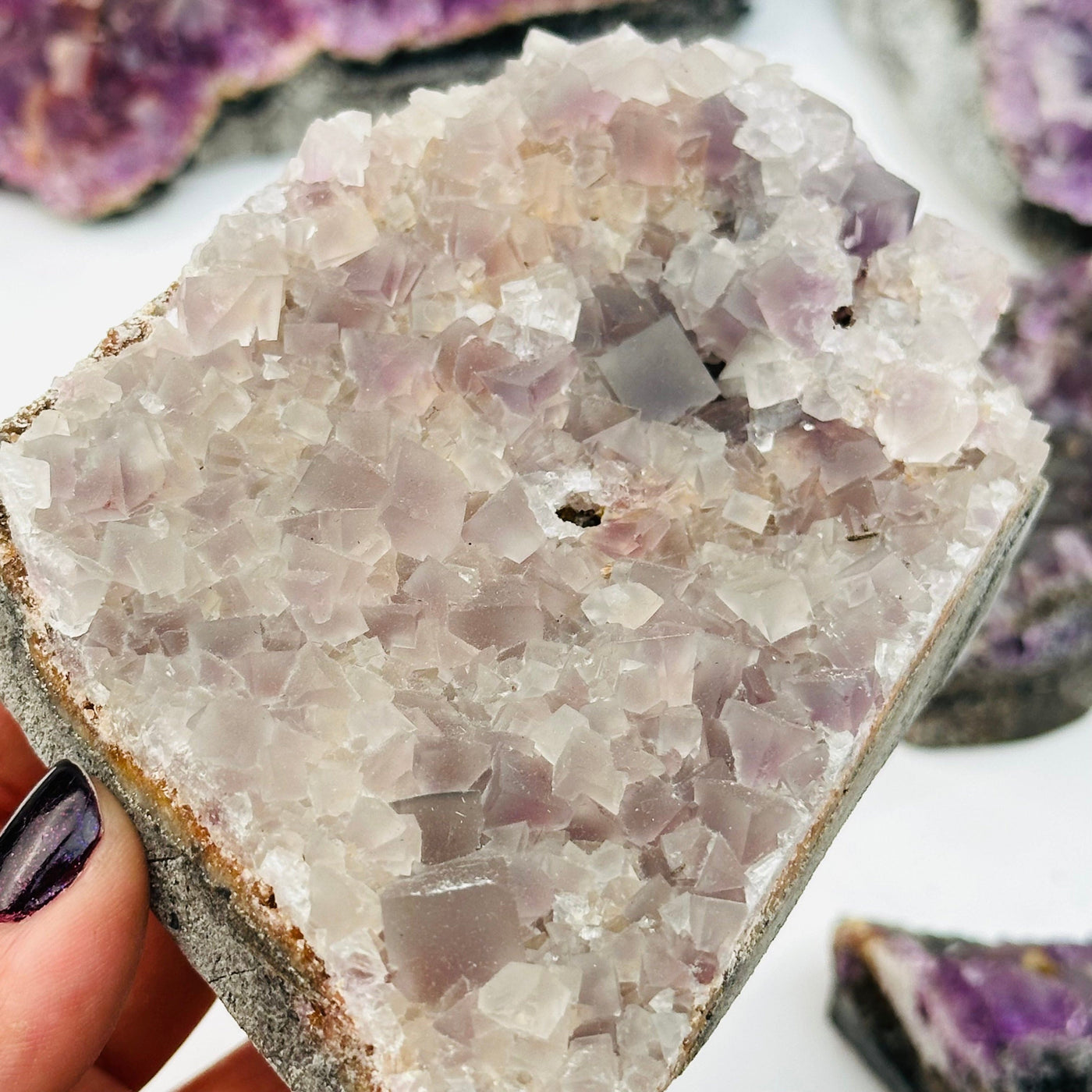 close up of the details on this fluorite cube crystal cluster 