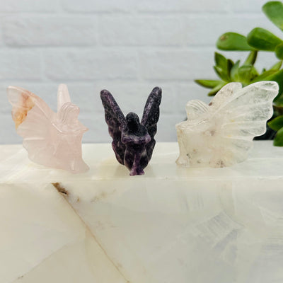 Carved Gemstone Fairies displayed as home decor 