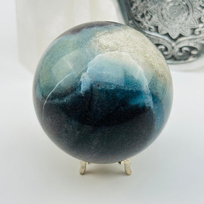crystal trolleite sphere displayed as home decor 