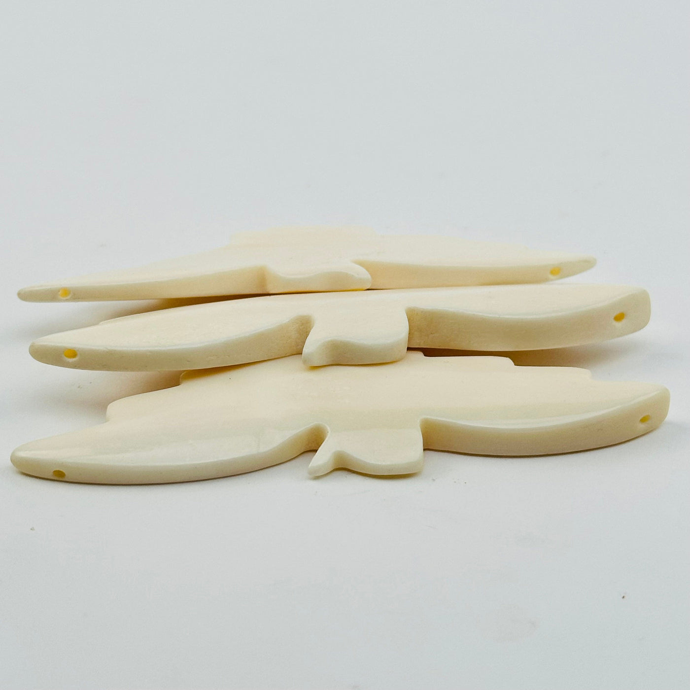 beads are drilled on the wing ends 