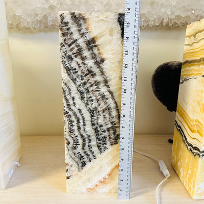 onyx lamp next to a ruler for size reference 