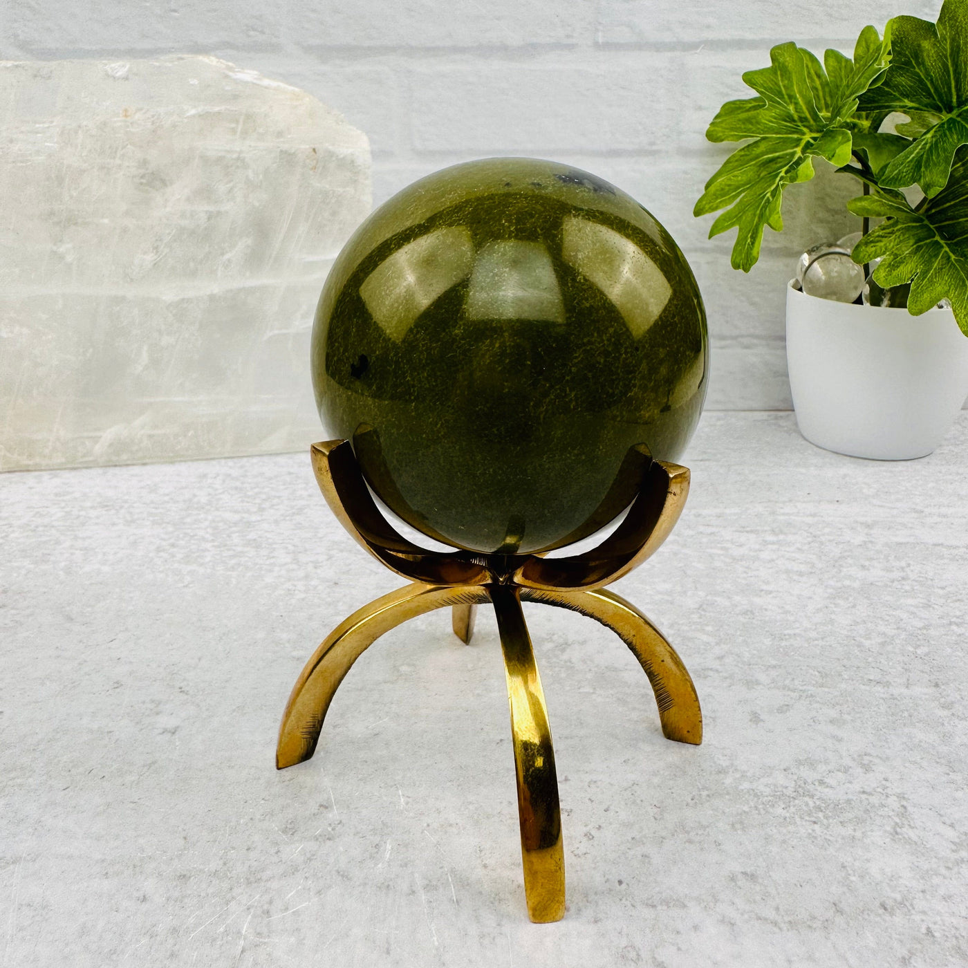Green Jade Polished Sphere displayed as home decor 