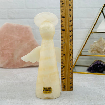  Mexican Onyx Angel - Carved Stone next to a ruler for size reference 