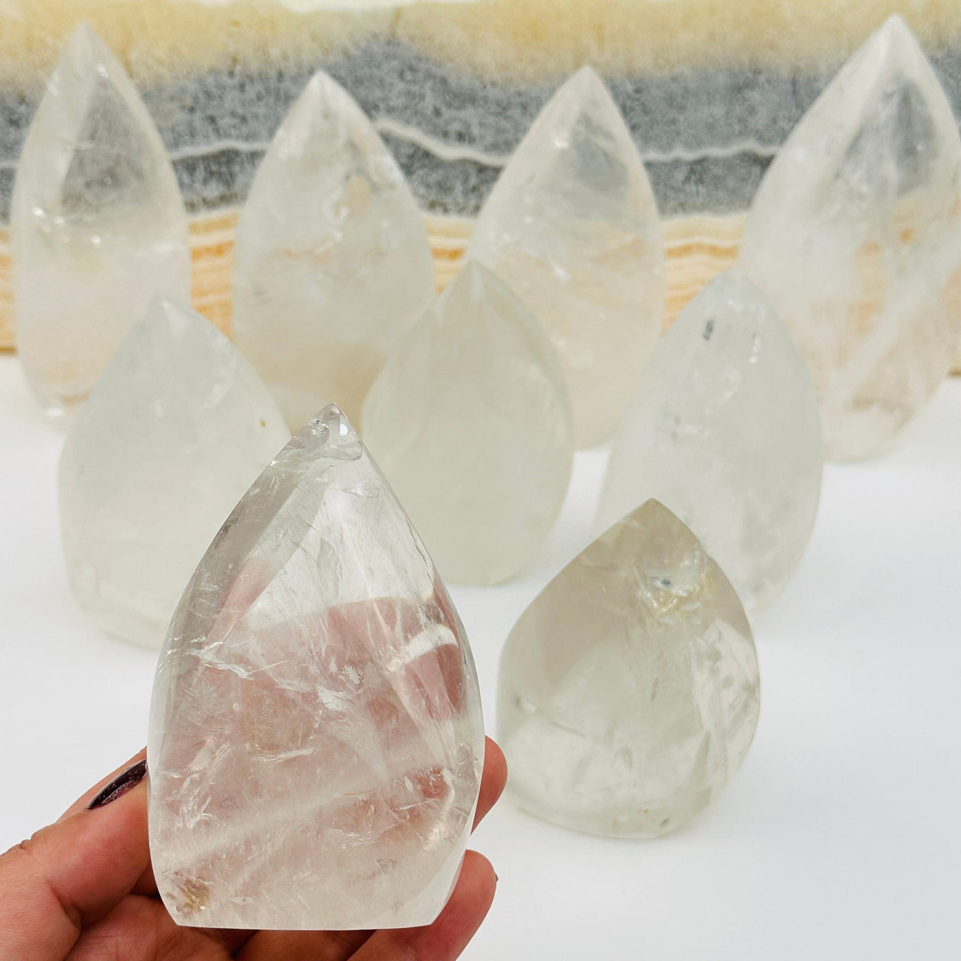 crystal quartz flame crystal in hand for size reference 